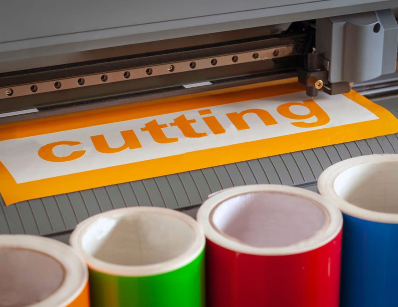Cutting plotter close-up. The process of cutting a vinyl film. плоттер